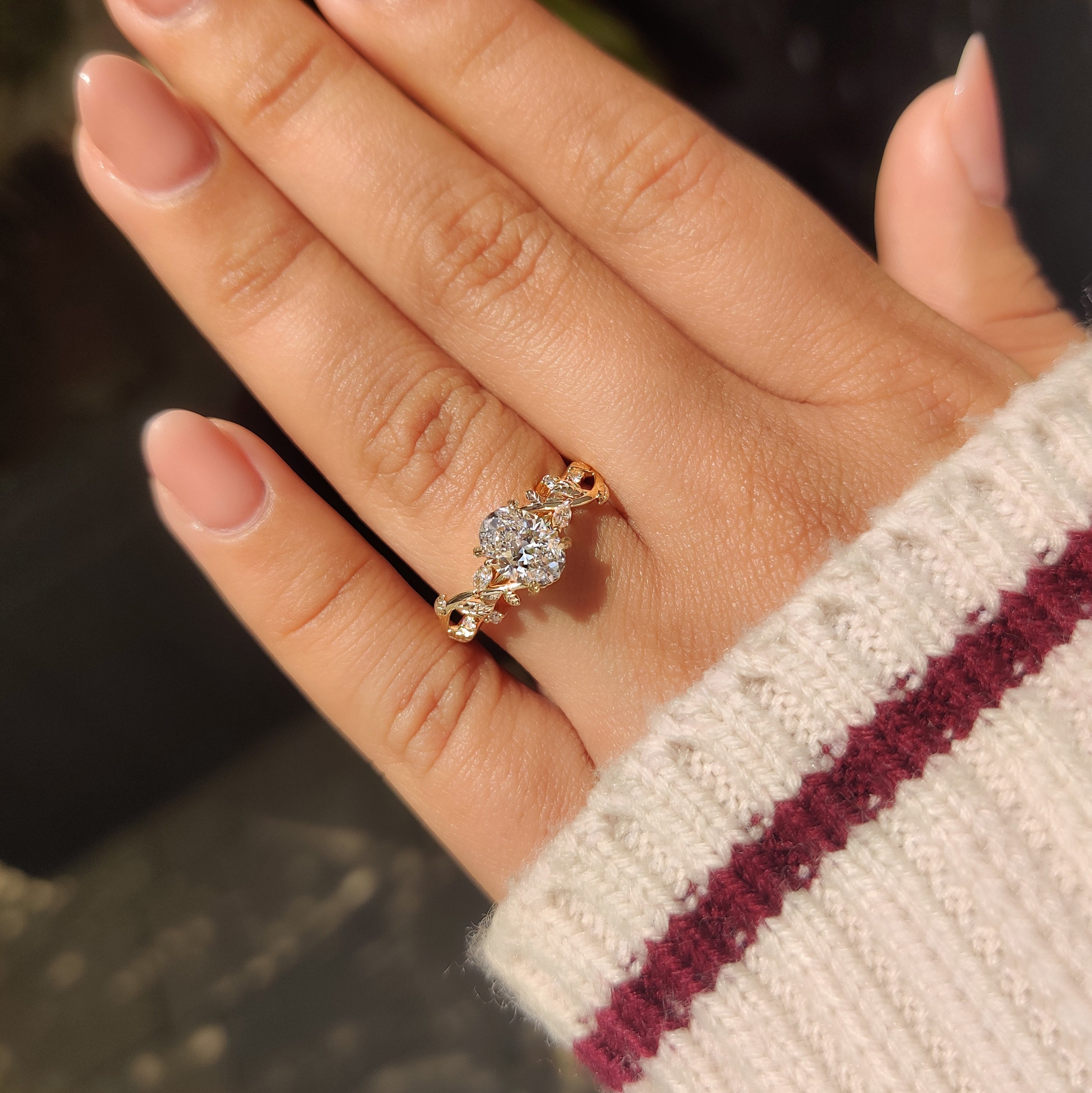 Nature Inspired Oval Diamond Ring with Leaf Style Prong Setting