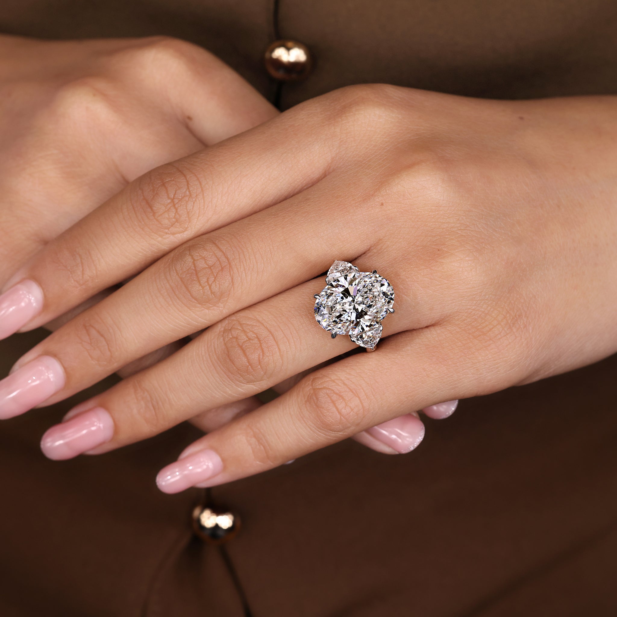 IGI Certified 10 -15 Carat Oval Diamond Ring in Three Stone Style