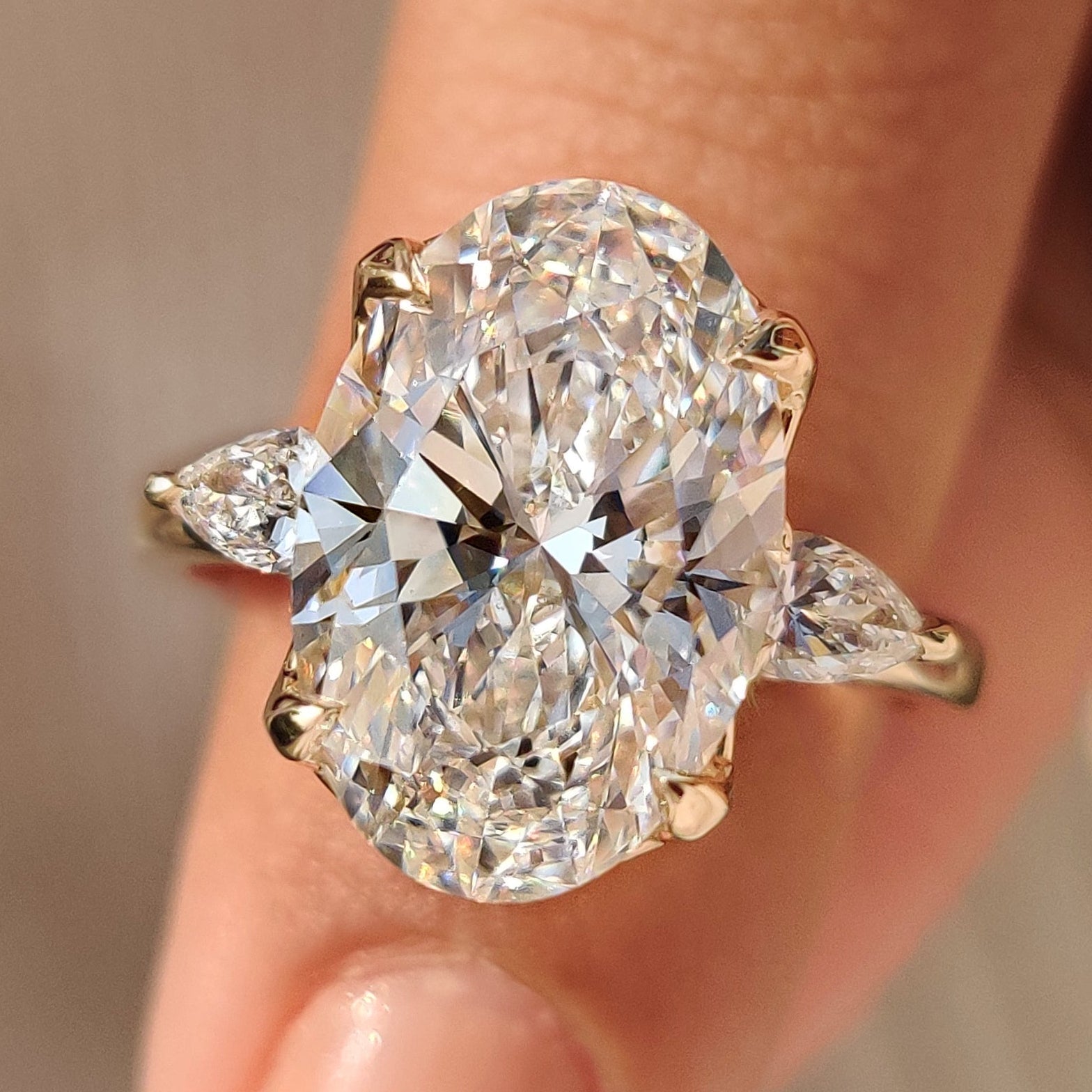 Oval Diamond Three Stone Engagement Ring With Pear Side Stone Main image