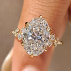 Oval Diamond Ring With Round Side Stones
