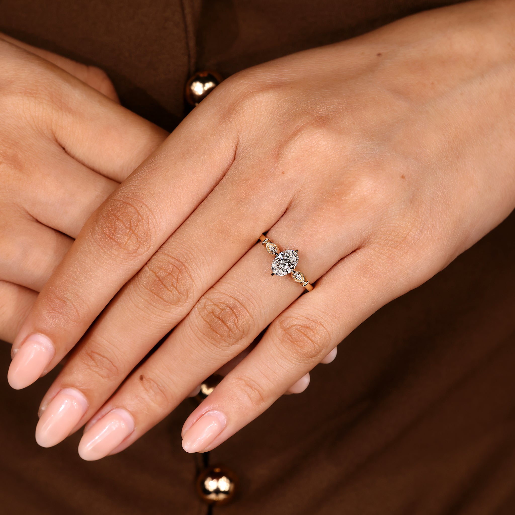 Oval Cut Diamond Ring With Round Side Stone Style