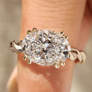 Solitaire Oval Cut Engagement Ring In East To West Setting