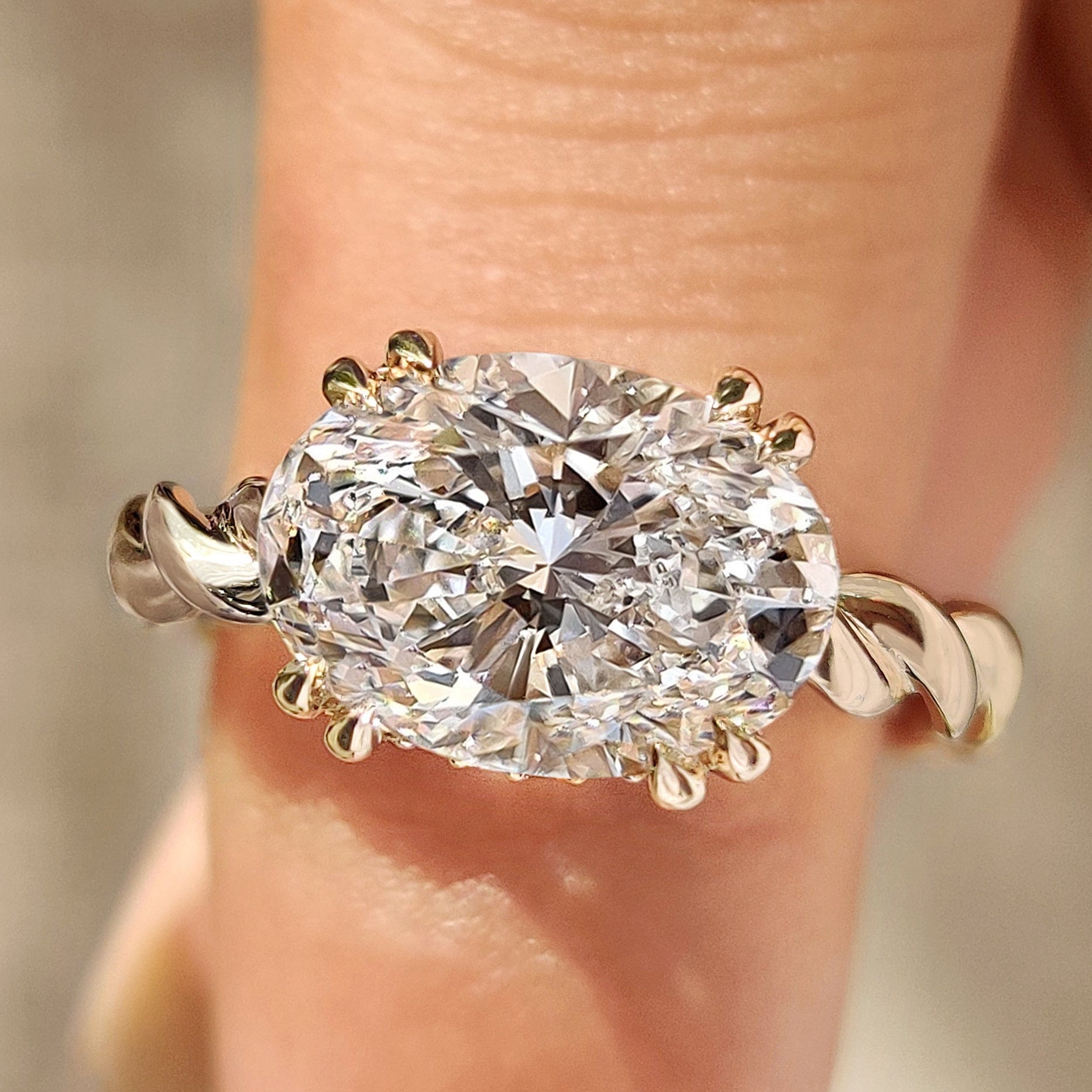 Solitaire Oval Cut Engagement Ring In East To West Setting