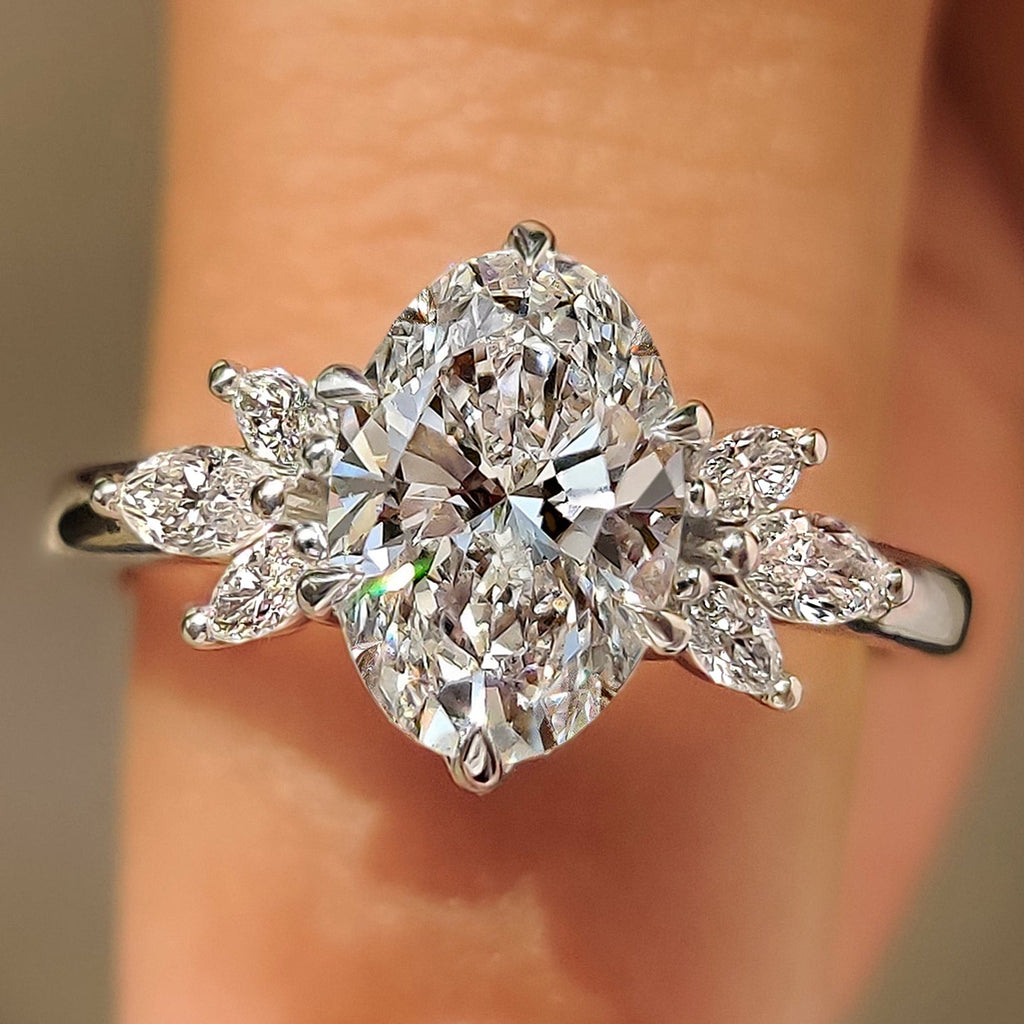 Oval Cut Diamond Ring With Side Stone Style In Muse Setting