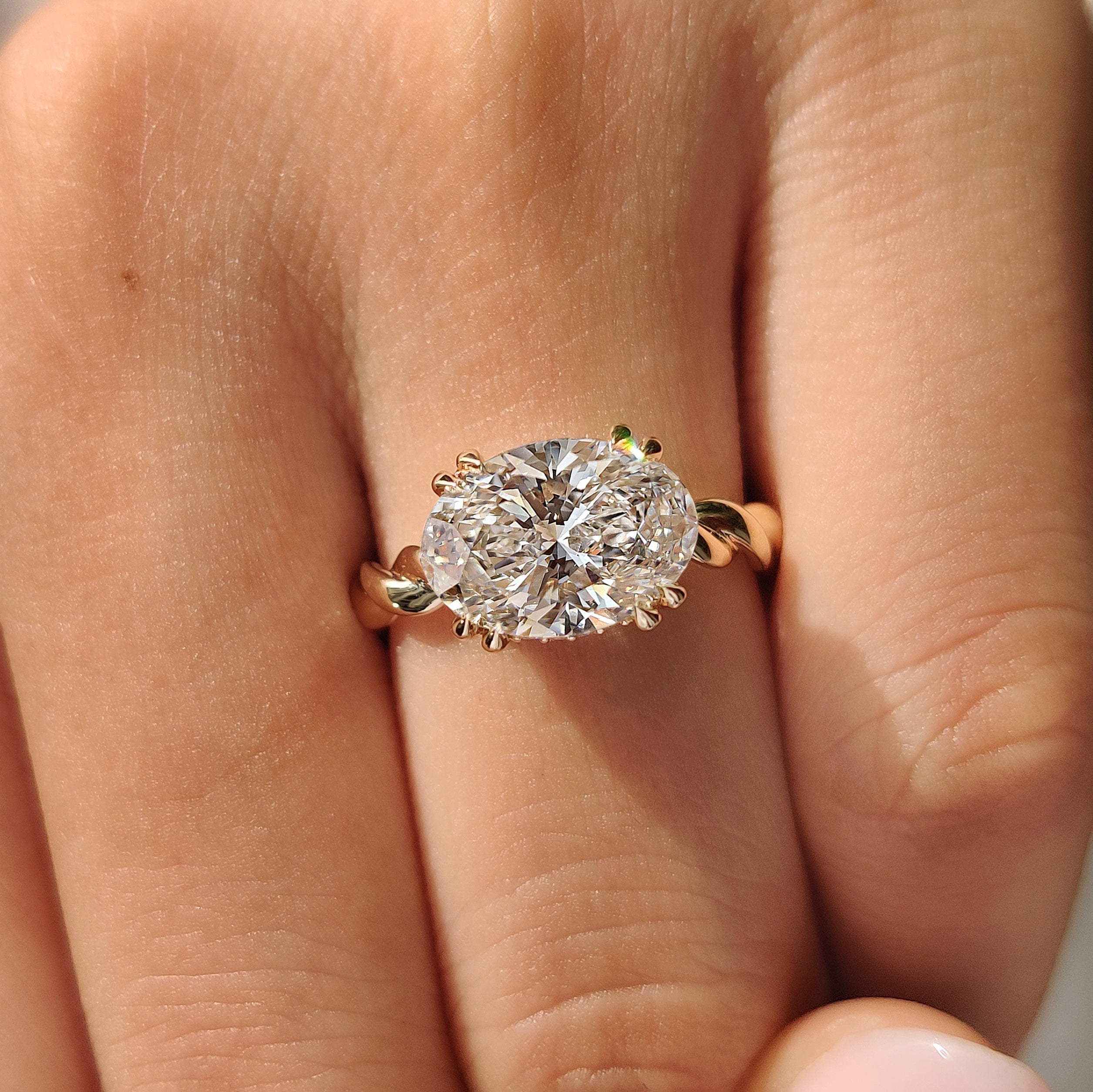 Solitaire Oval Cut Engagement Ring In East To West Setting