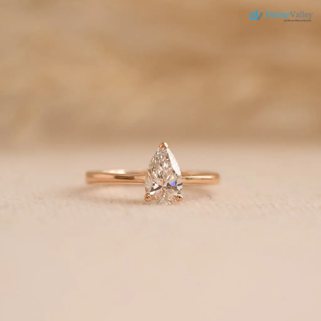 Pear cut 2.5 caret lab grown single stone slim engagement ring - DisneyValley