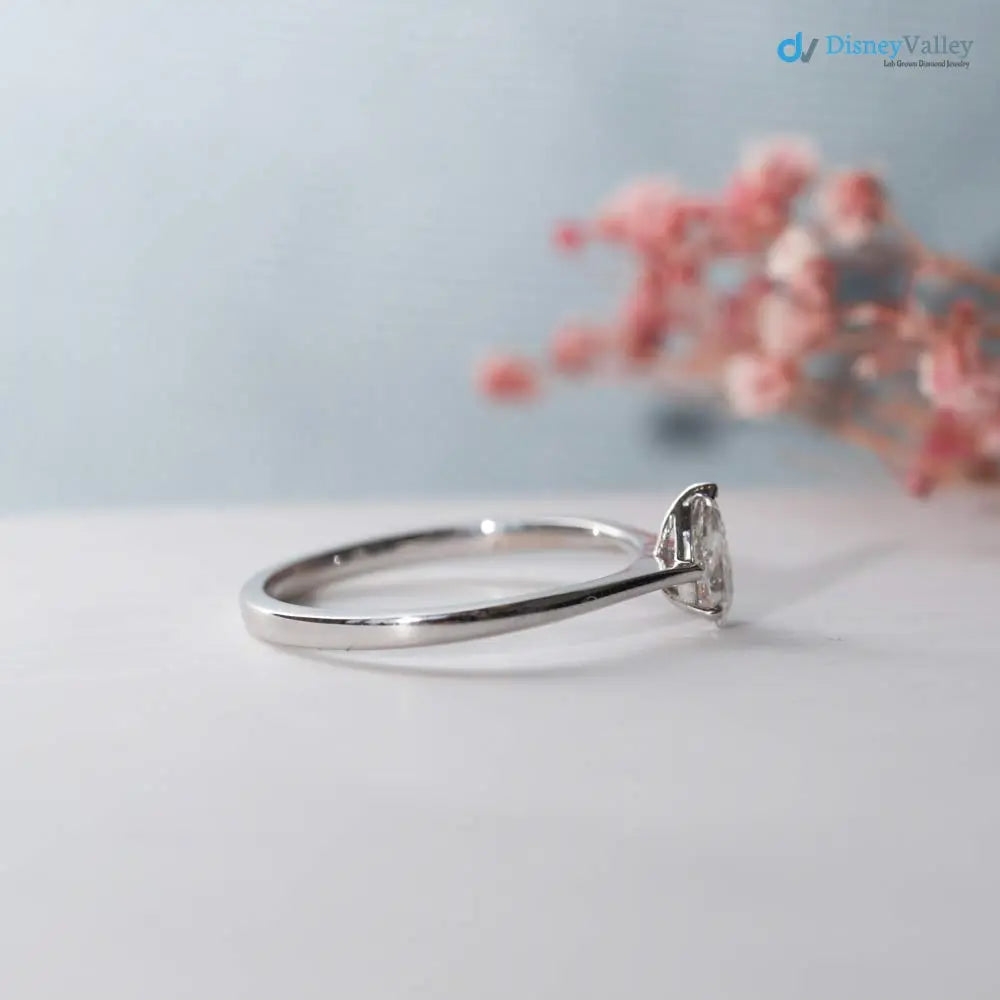 Pear cut 2.5 caret lab grown single stone slim engagement ring - DisneyValley
