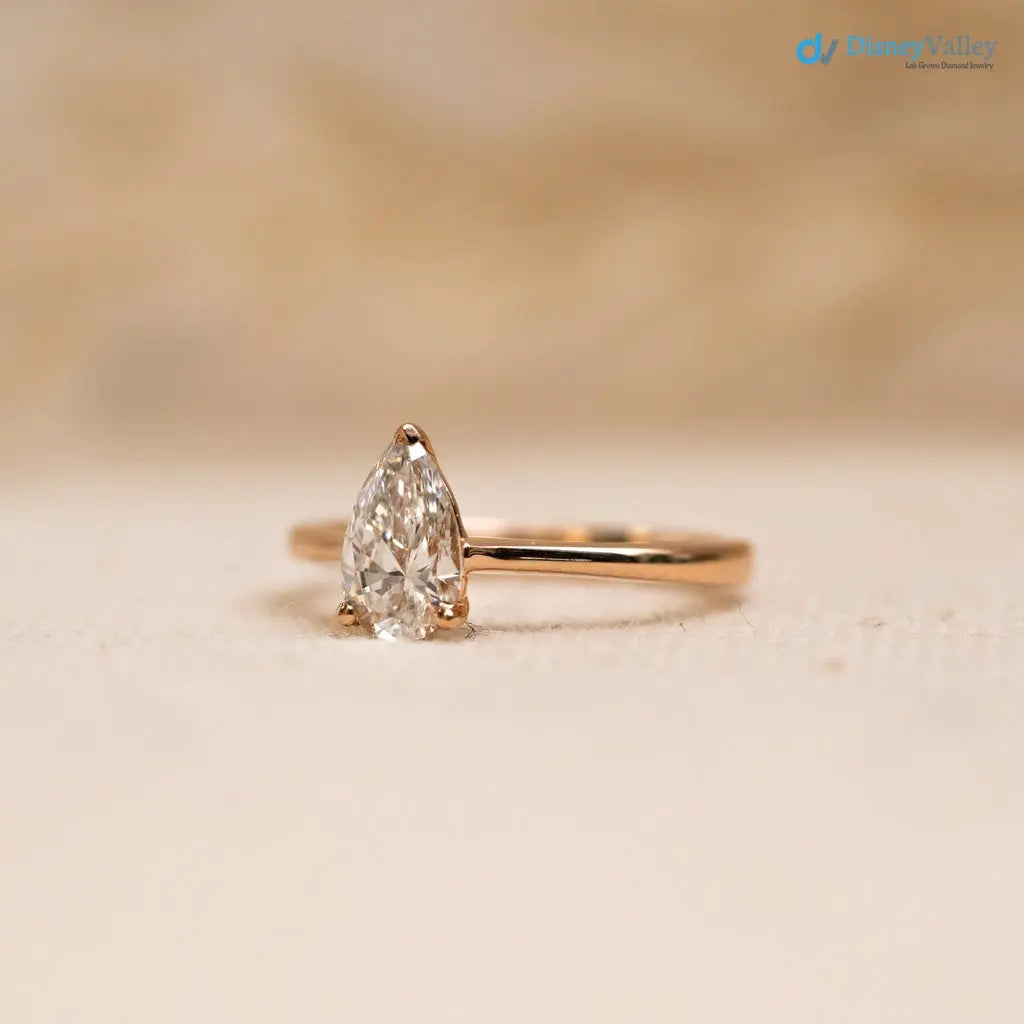Pear cut 2.5 caret lab grown single stone slim engagement ring - DisneyValley