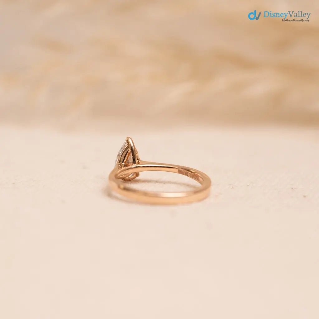 Pear cut 2.5 caret lab grown single stone slim engagement ring - DisneyValley