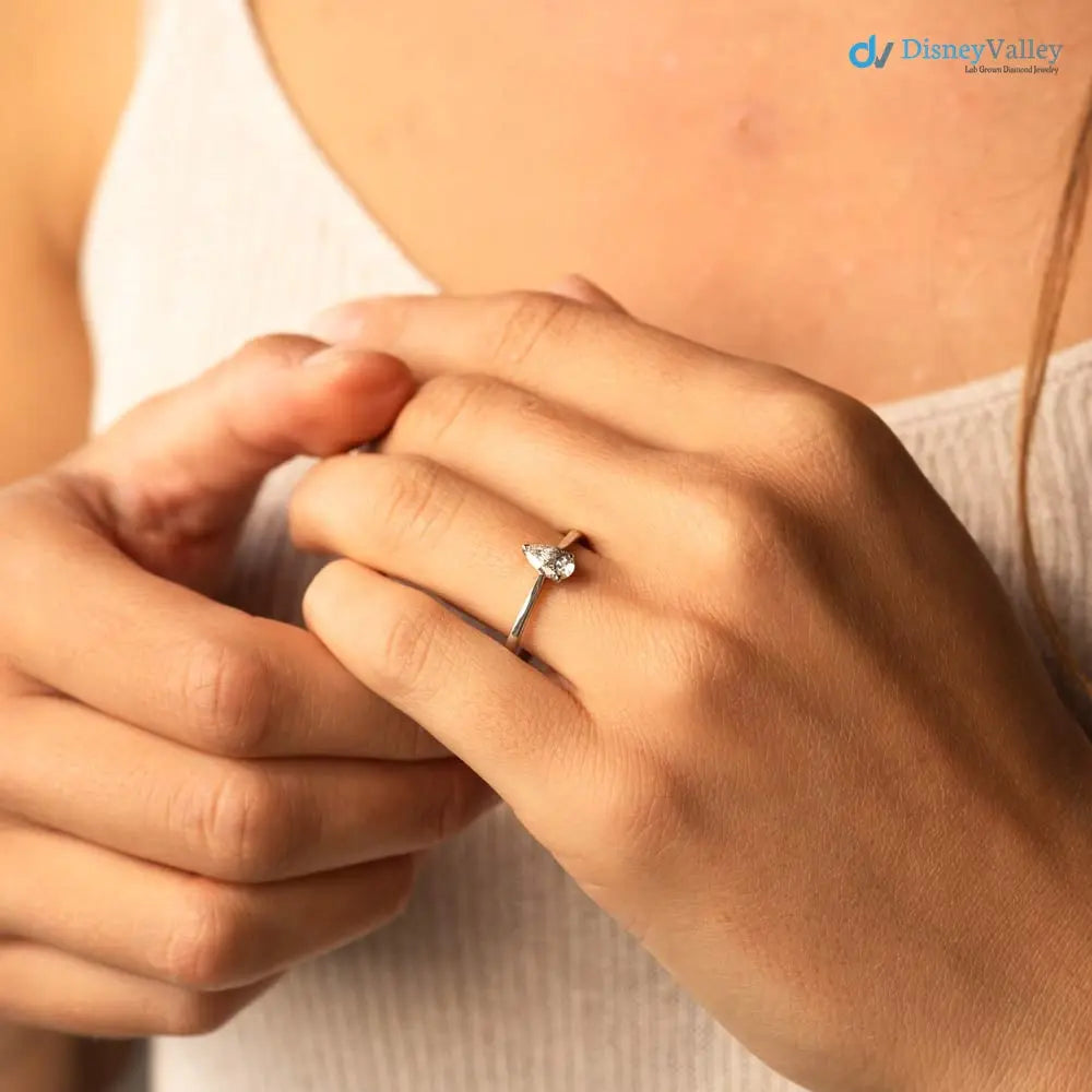 Pear cut 2.5 caret lab grown single stone slim engagement ring - DisneyValley