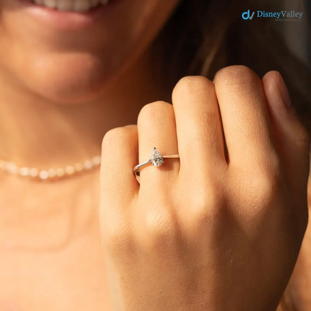 Pear cut 2.5 caret lab grown single stone slim engagement ring - DisneyValley