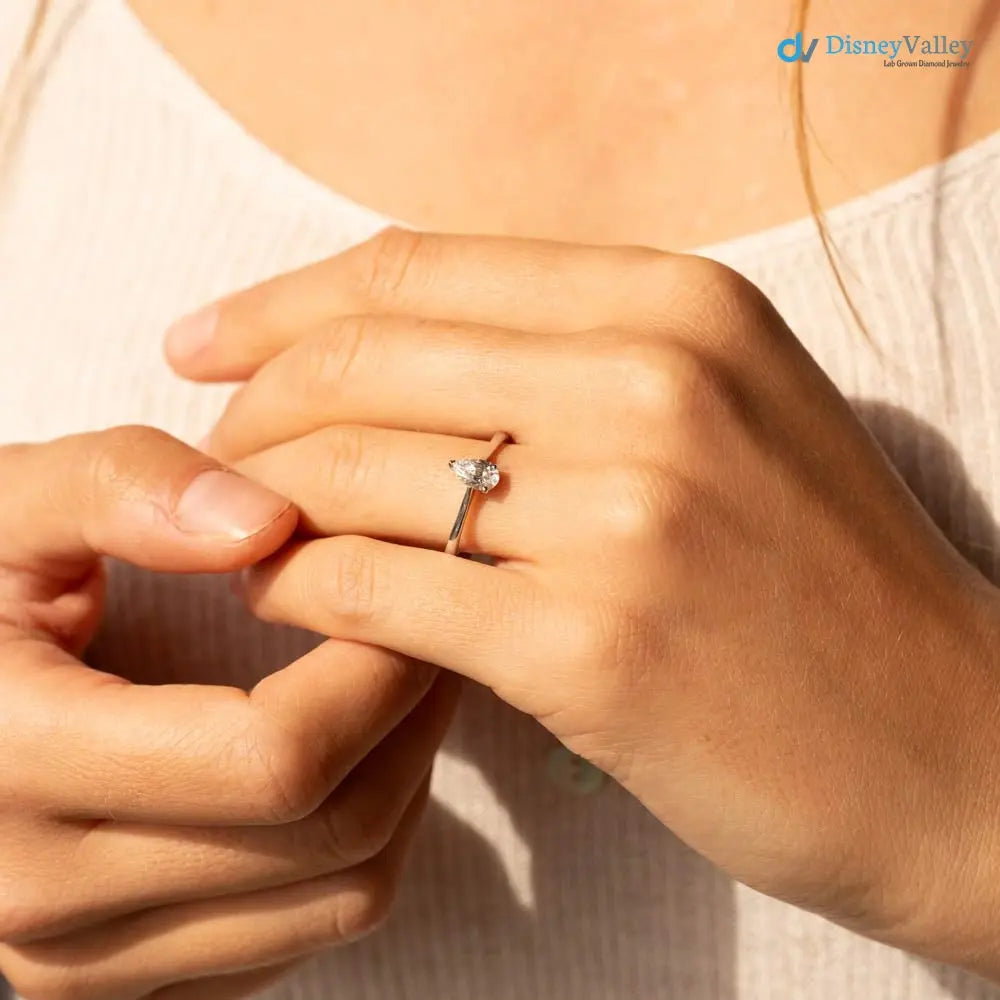 Pear cut 2.5 caret lab grown single stone slim engagement ring - DisneyValley
