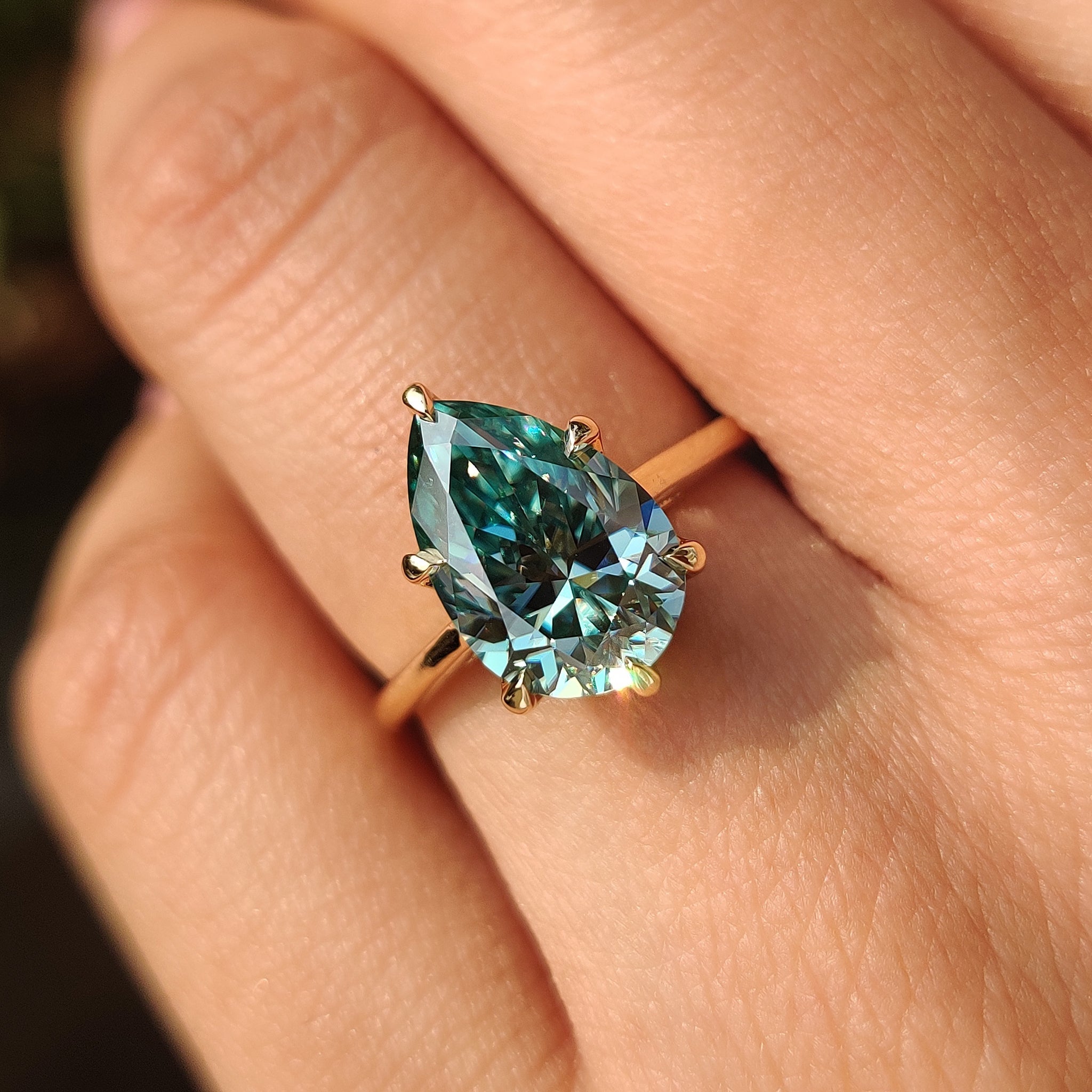 Cyan Blue Pear Cut Moissanite Ring in Solitaire Style