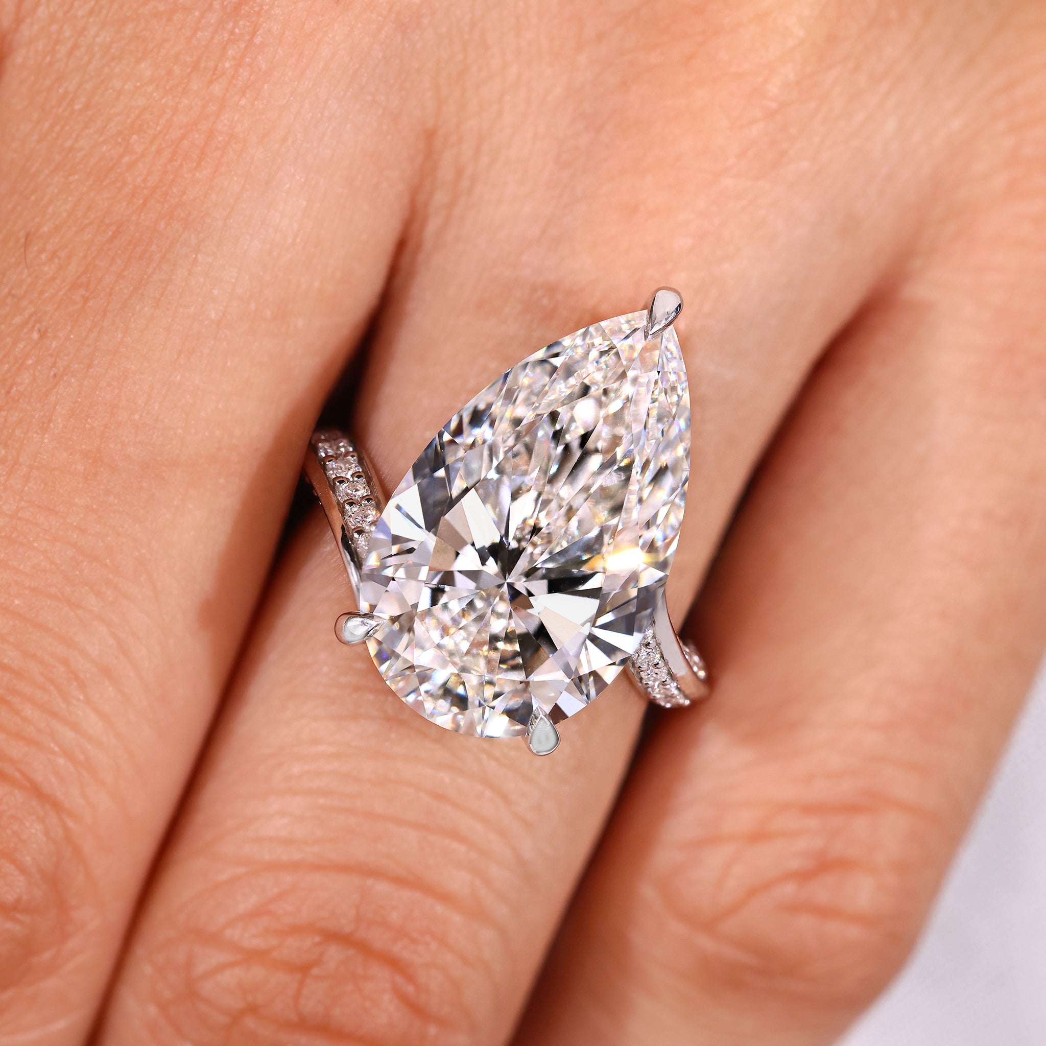 IGI Certified 10 - 12 Carat Pear Diamond Ring in Bypass Setting Secondary image