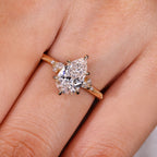 Pear Cut Engagement Ring With Side Stone In Vintage Style