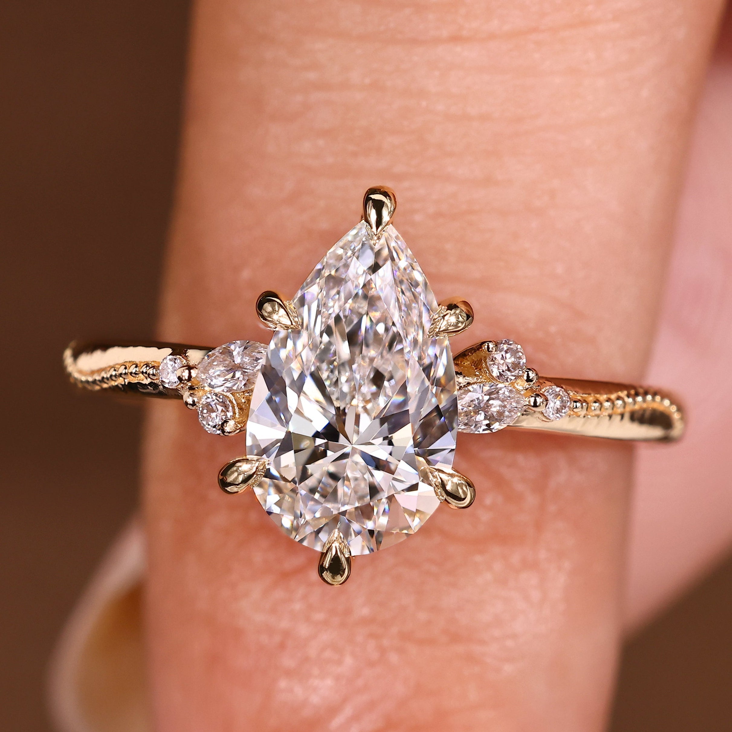 Pear Cut Engagement Ring With Side Stone In Vintage Style Main image