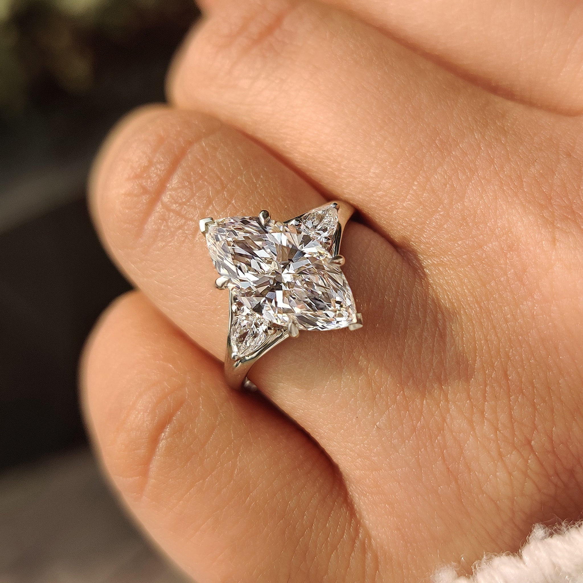 Three Stone Marquise Diamond Ring with Pear Side Diamond