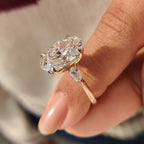 Oval Diamond Three Stone Engagement Ring With Pear Side Stone