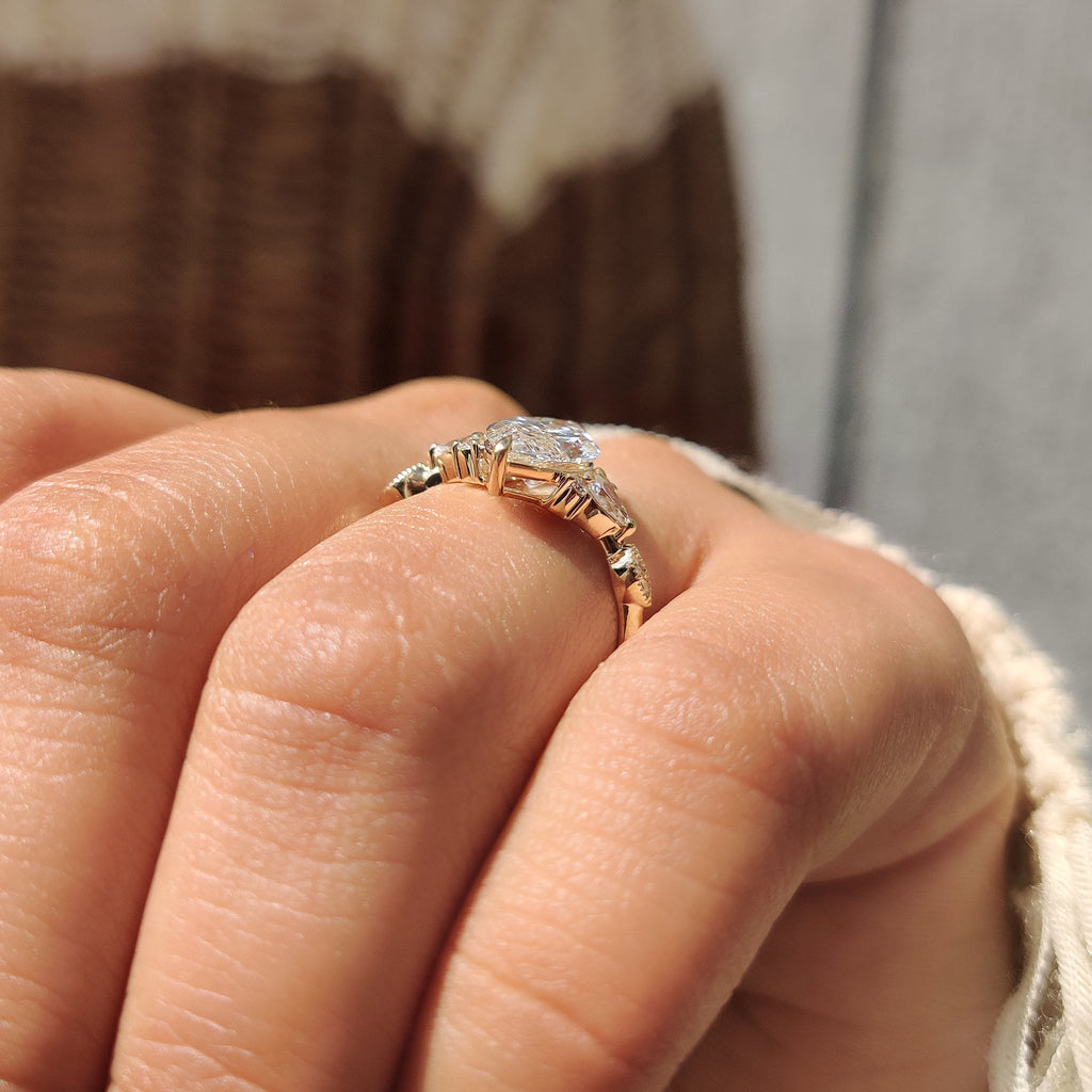 Marquise Cut Ring with Pear and Round Side Stones