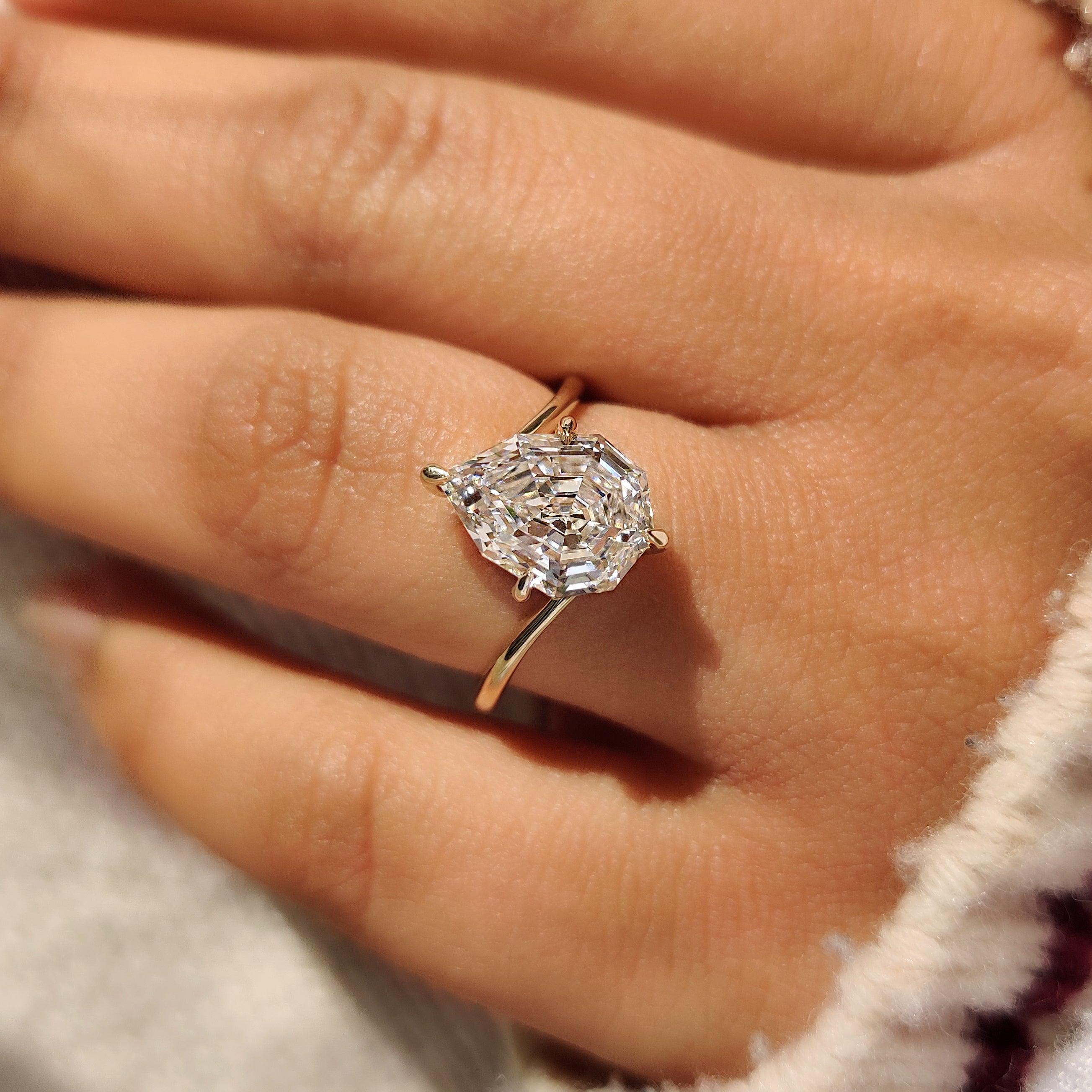 Pear Step Cut Diamond Solitaire Engagement Ring in Bypass Setting