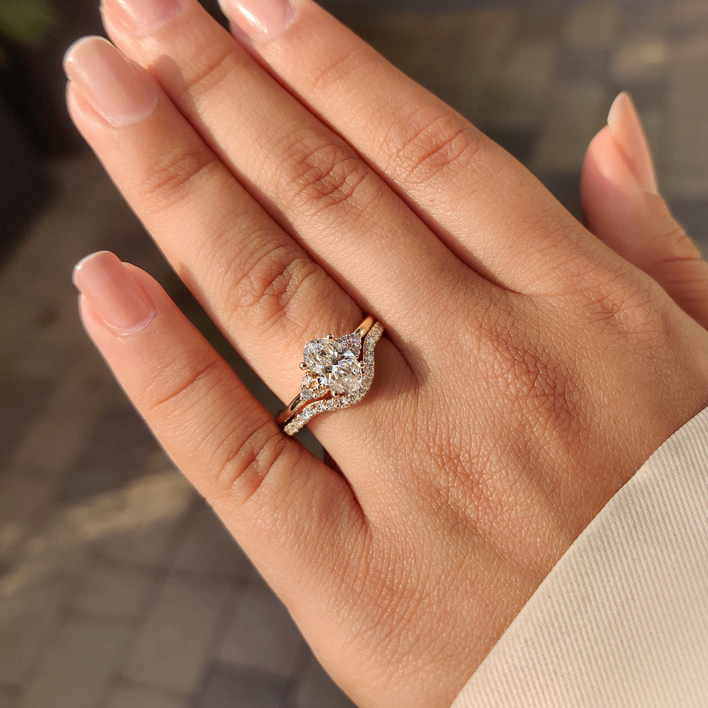 Oval Engagement Ring with Wedding Band in Half Eternity Style