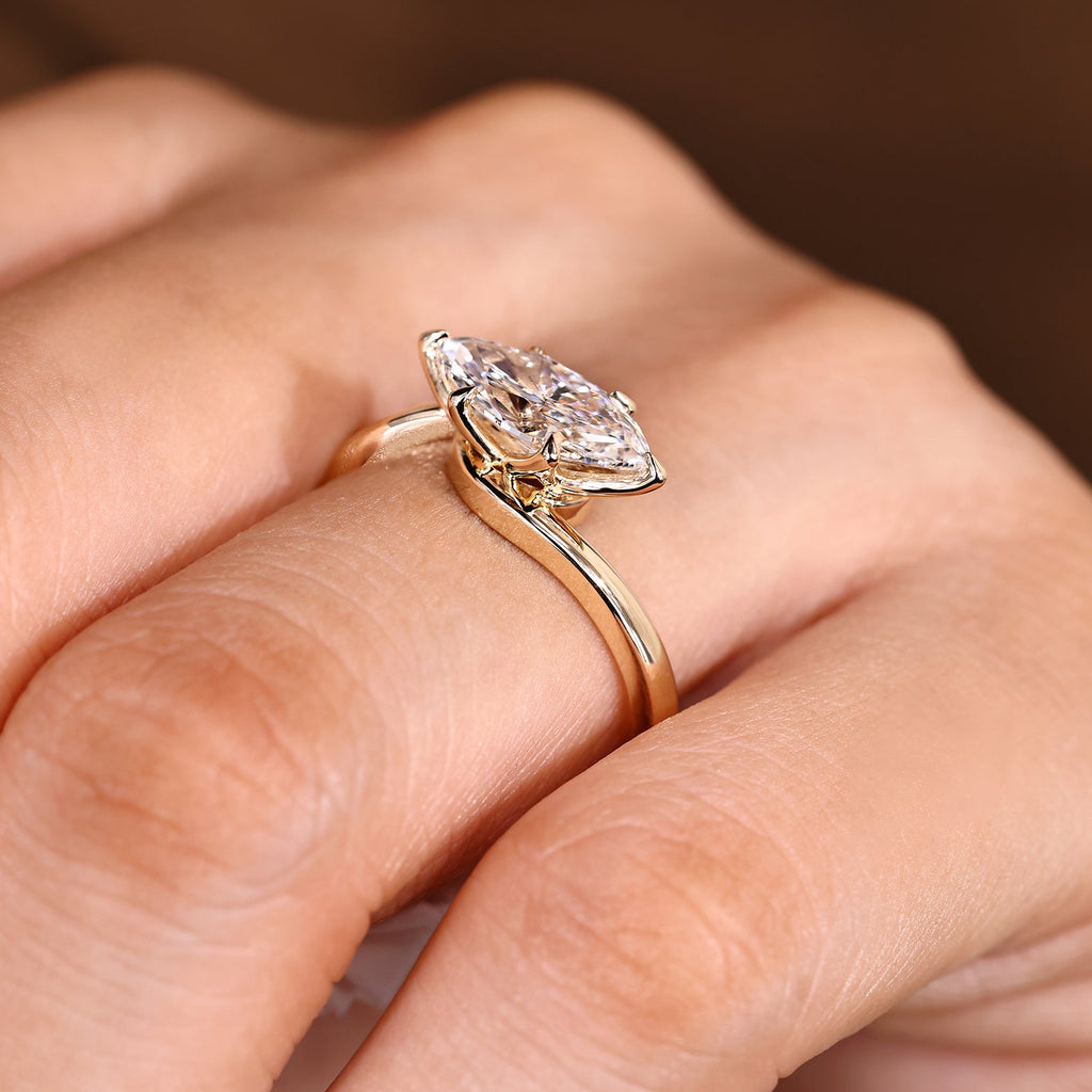 Solitaire Marquise Engagement Ring In East To West Setting