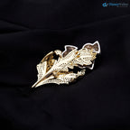 Queen Elizabeth’s Scottish Thistle Brooch, Rose Brooch for England, The Daffodil Brooch DisneyValley