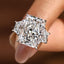 10 - 14 Carat Radiant Cut Diamond Ring with Trapezoid Side Stones