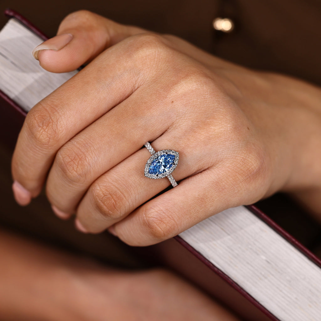 Blue Marquise Cut Diamond Ring in Halo Style
