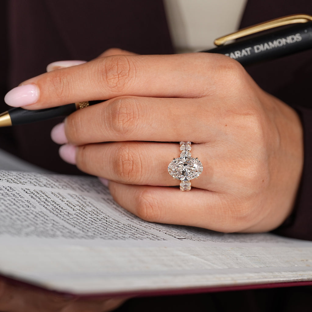 Oval Engagement Ring with Four Claw Prong Setting