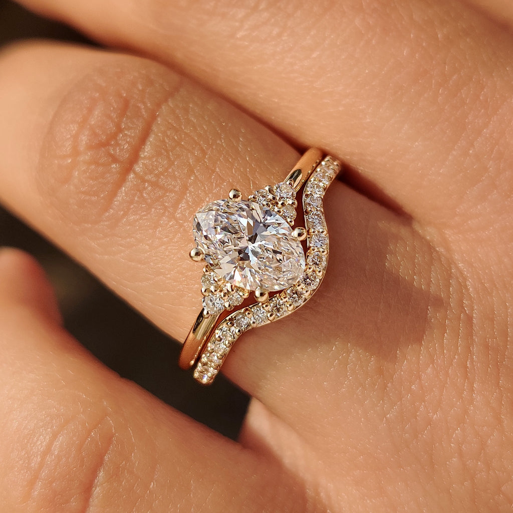 Oval Engagement Ring with Wedding Band in Half Eternity Style