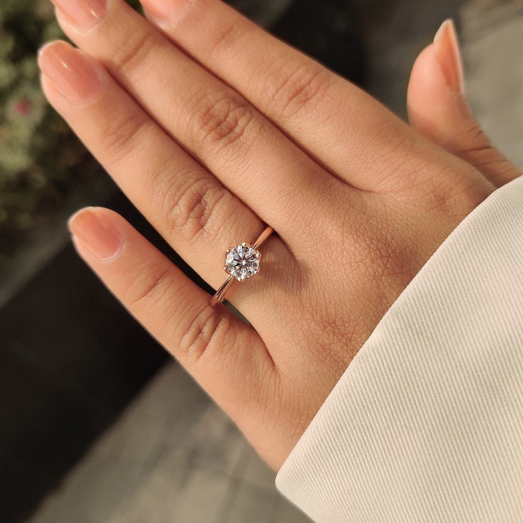 Solitaire Style Round Cut Diamond Ring with Hidden Blue Sapphire