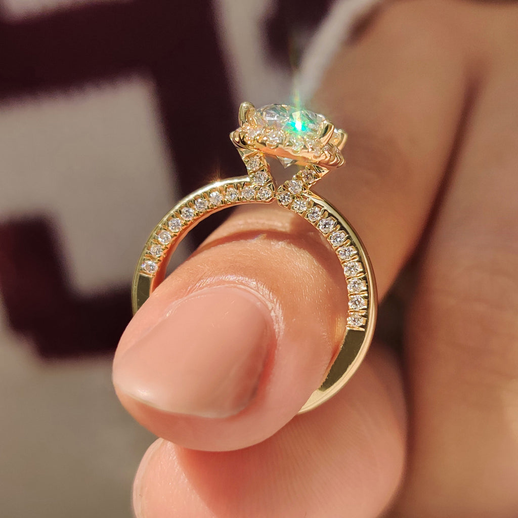 Oval Cut Diamond Ring in Round Cut Diamond Basket Setting