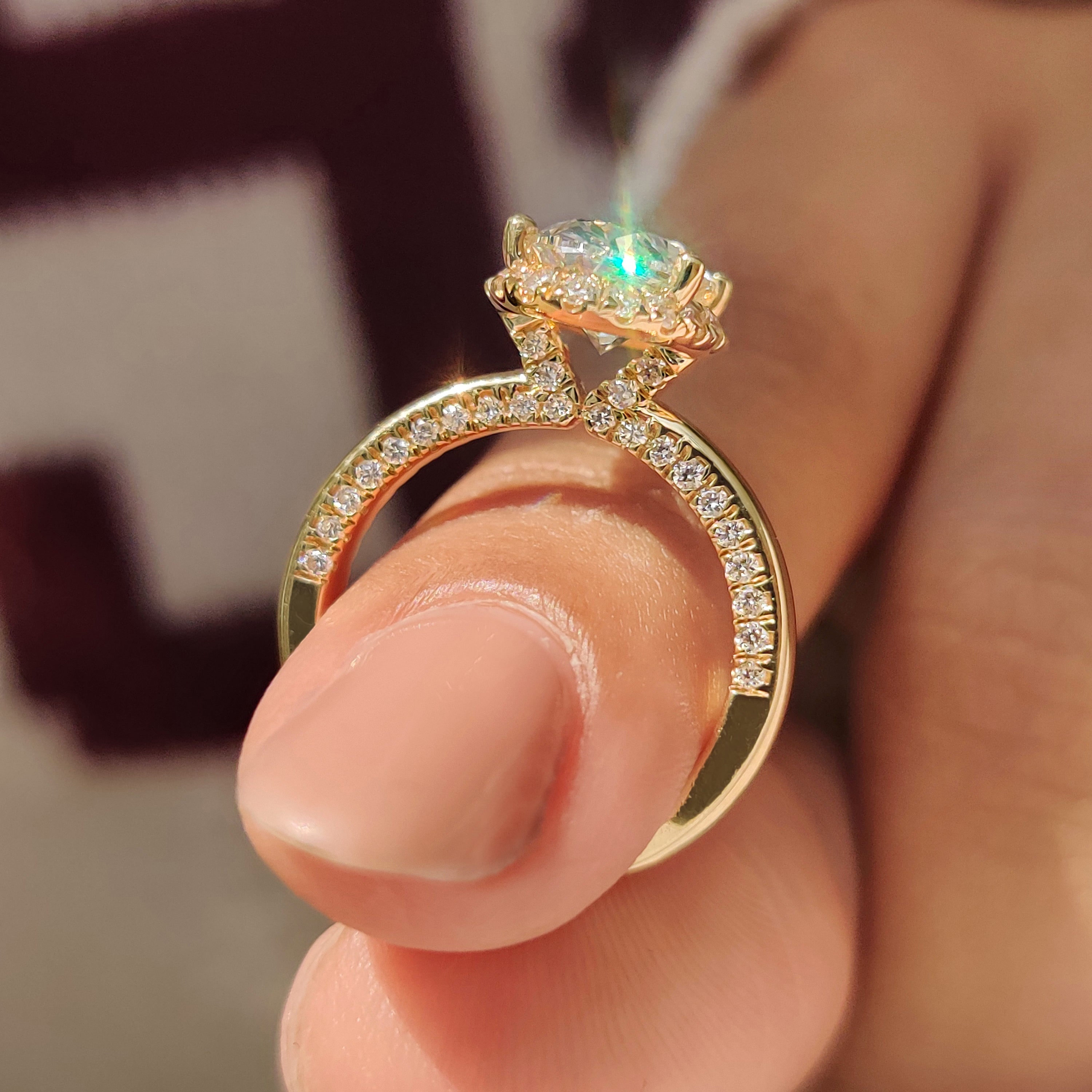 Oval Cut Diamond Ring in Round Cut Diamond Basket Setting