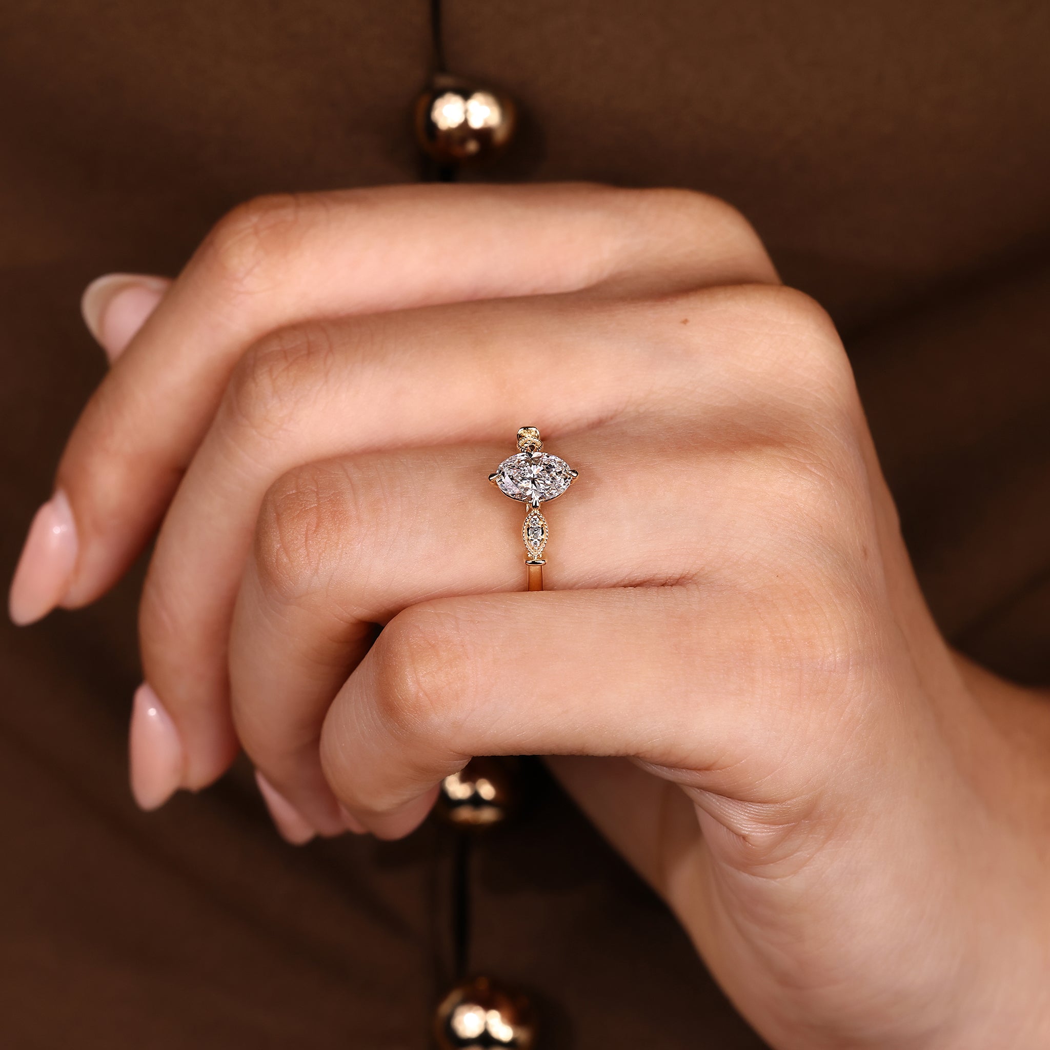 Oval Cut Diamond Ring With Round Side Stone Style
