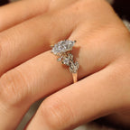 Nature Inspired Marquise Cut Engagement Ring with Round Side Stone
