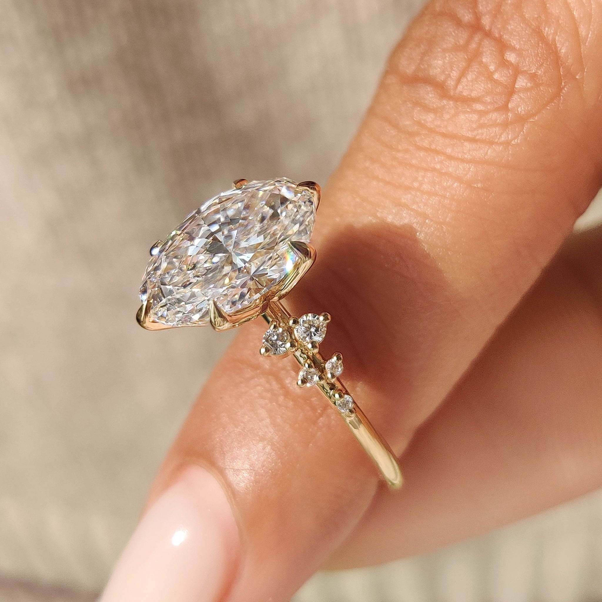 Oval Diamond Ring With Round Side Stones