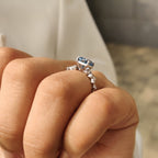 Blue Cushion Cut Diamond Ring in Cluster Setting