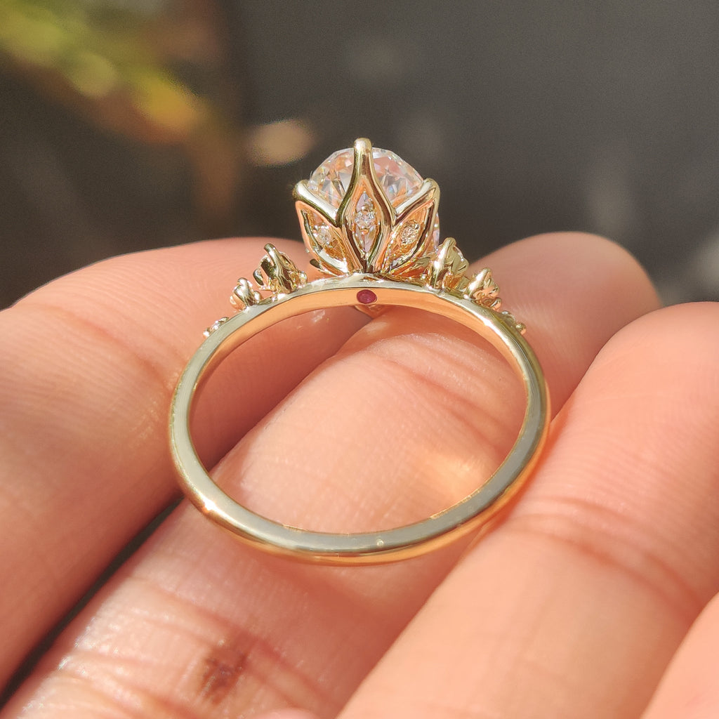 Oval Diamond Ring With Round Side Stones