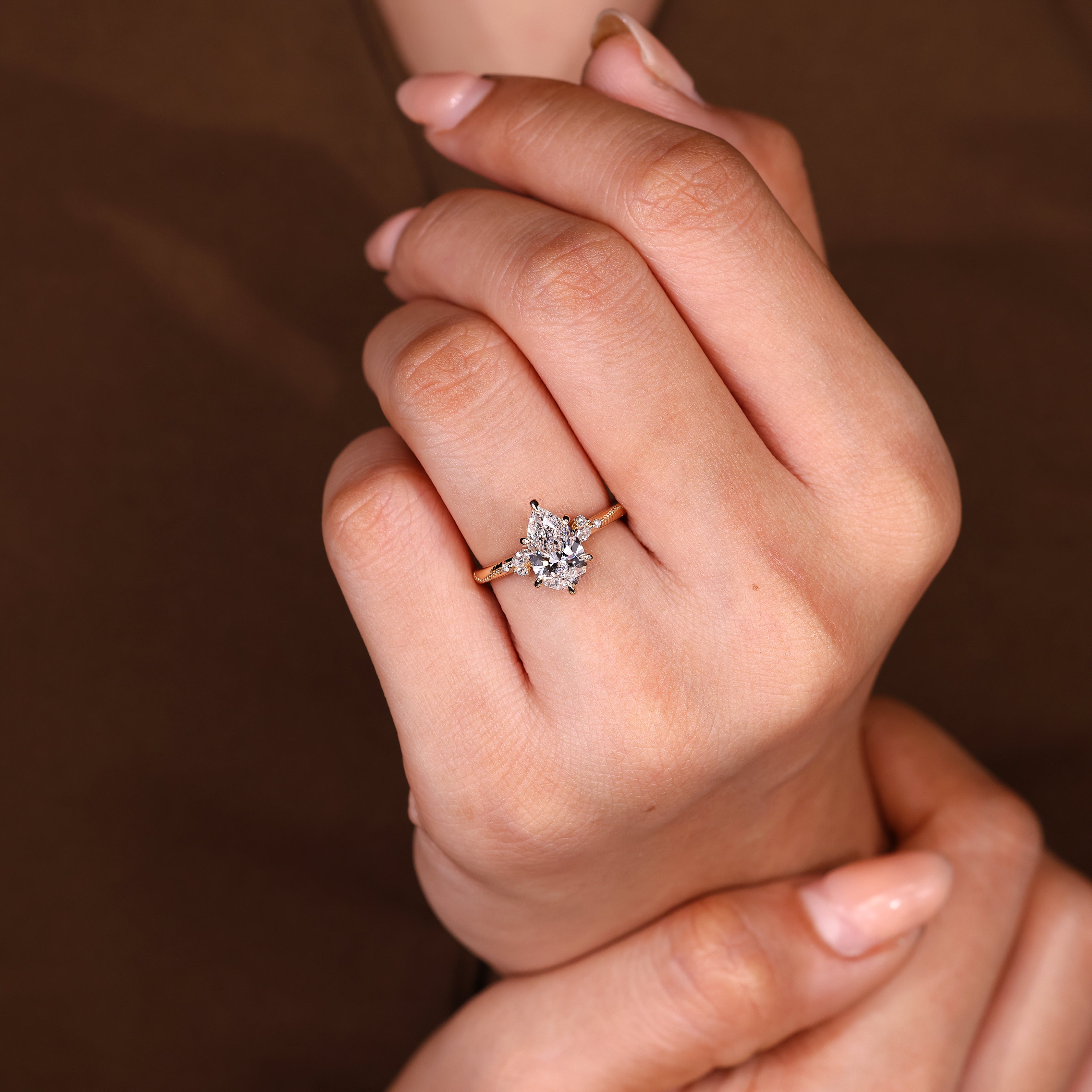 Pear Cut Engagement Ring With Side Stone In Vintage Style