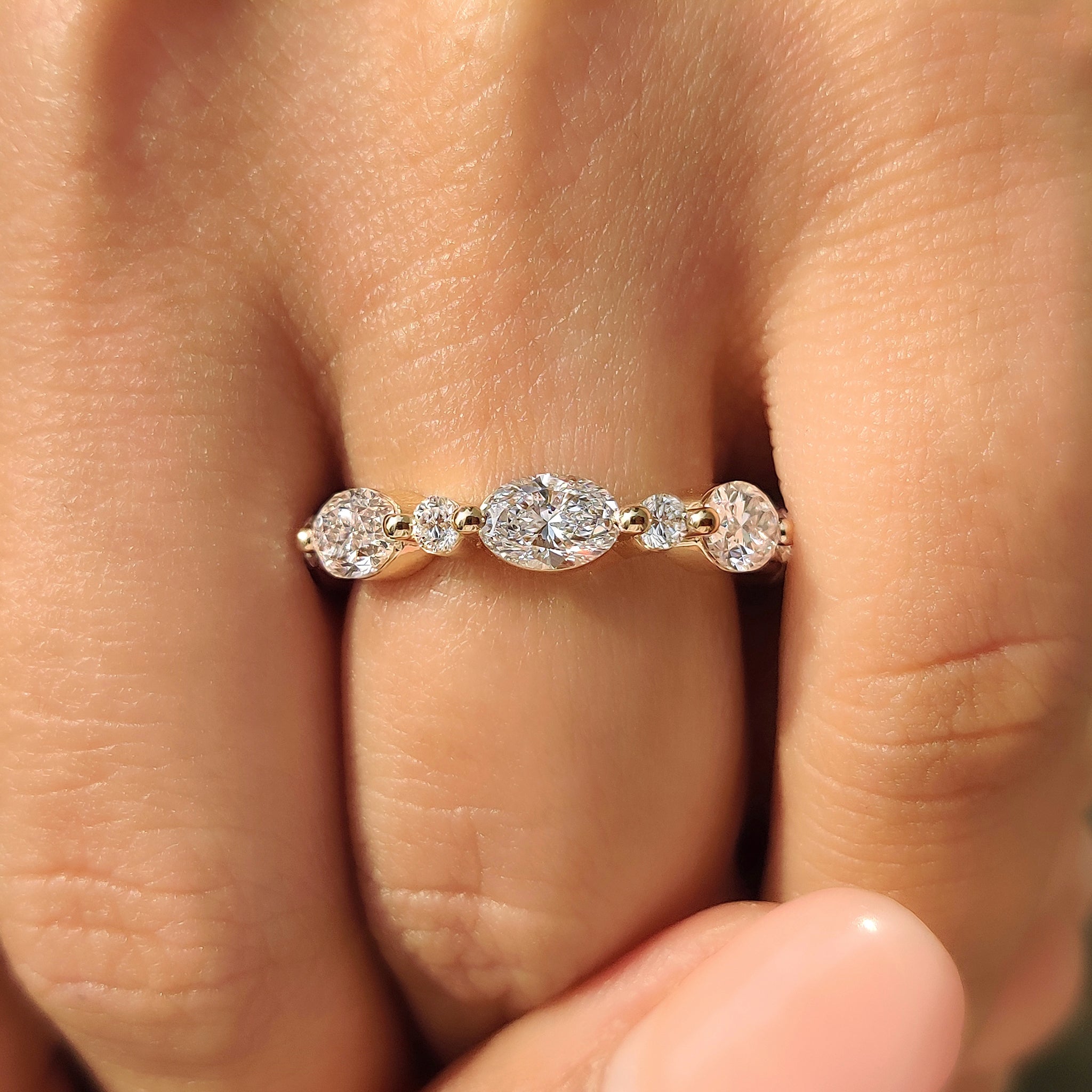 Round and Oval Cut Diamond Half Eternity Band
