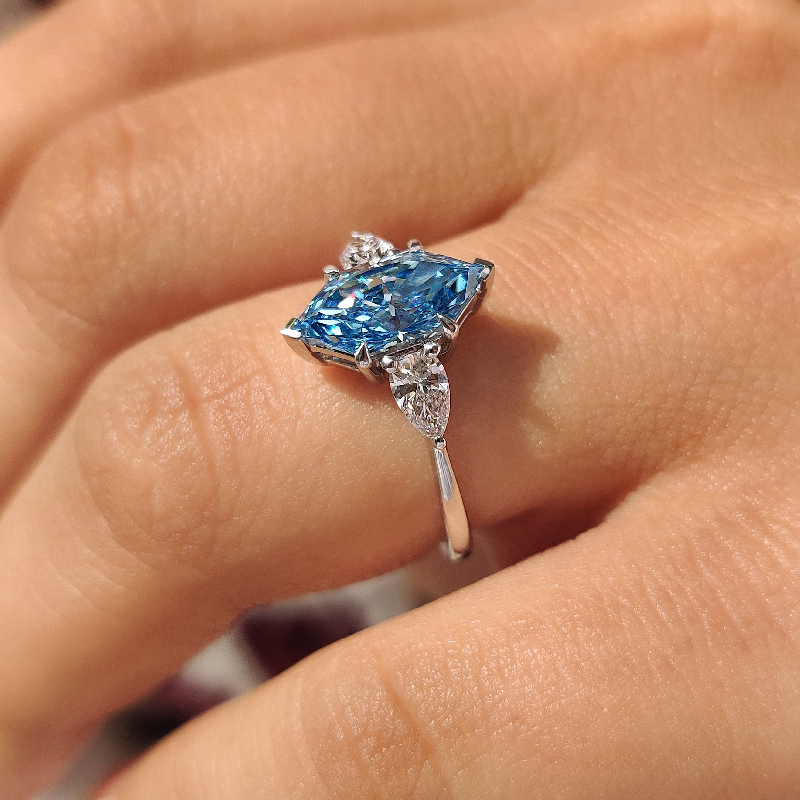 Blue Dutch Marquise Three Stone Ring with Pear Side Stones