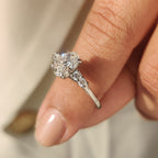 Oval Cut Diamond Ring with Round Side Stones