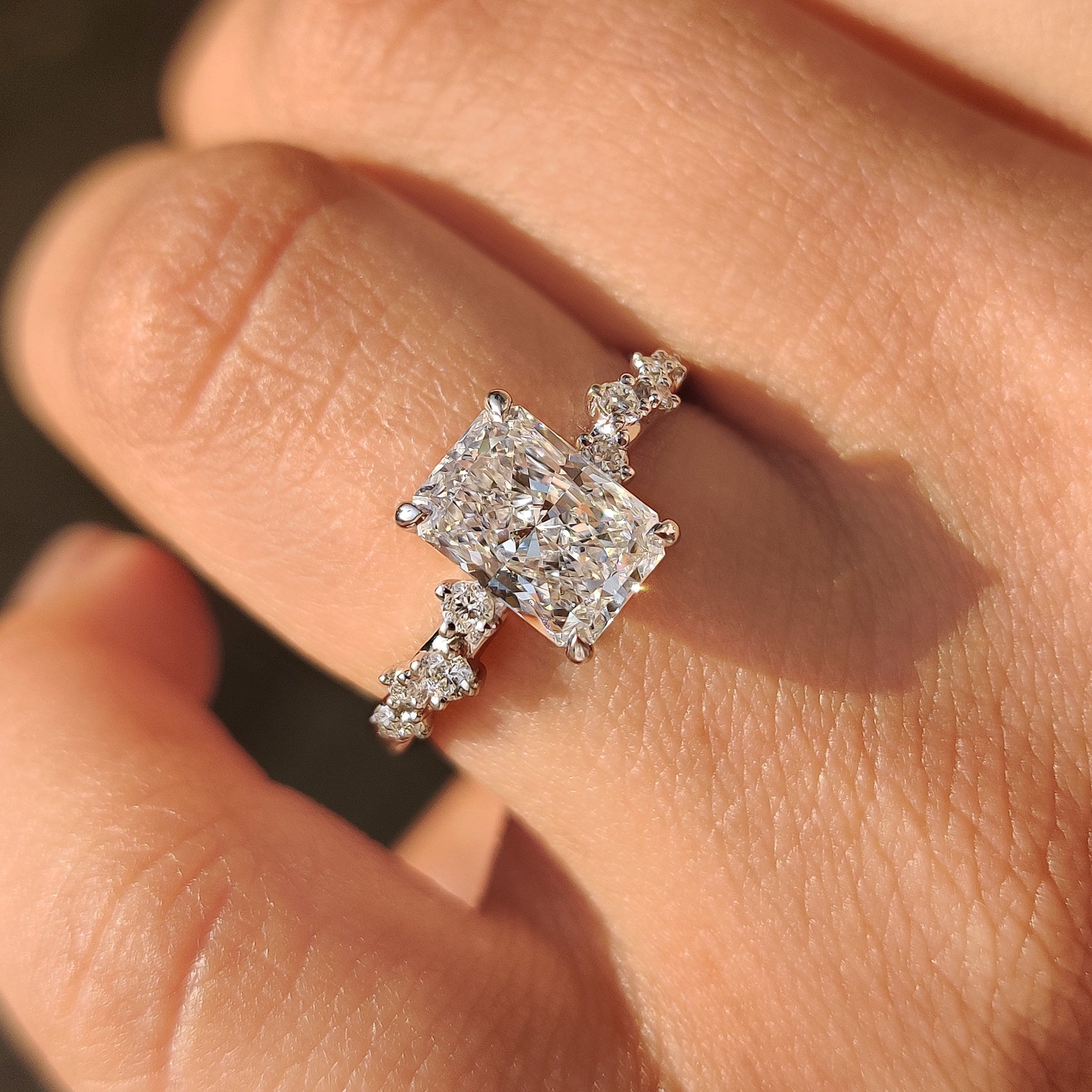 Radiant Cut Diamond Ring in Cluster Setting