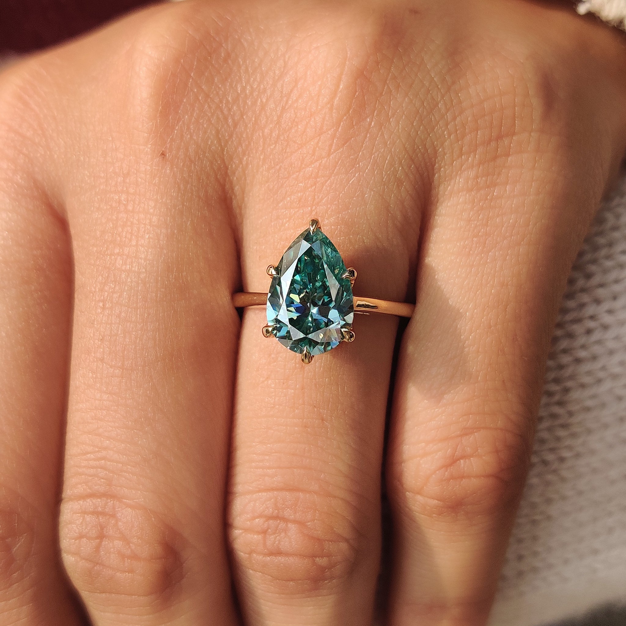 Cyan Blue Pear Cut Moissanite Ring in Solitaire Style