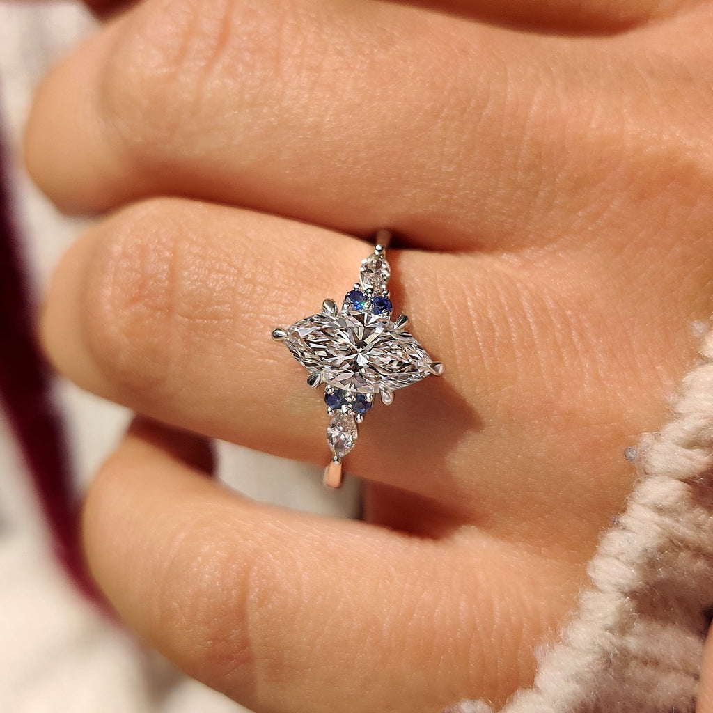Marquise Cut Engagement Ring With Blue Sapphire Side Stone Style