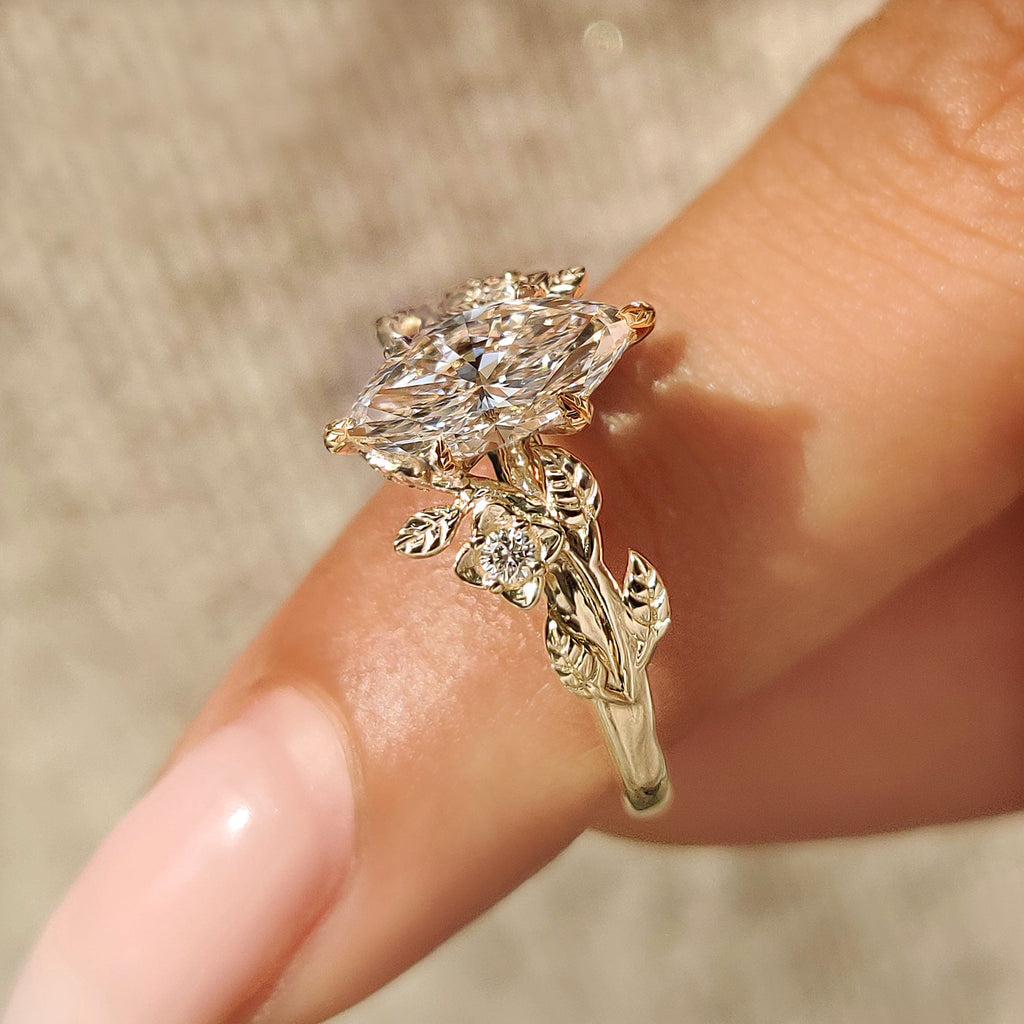 Nature Inspired Marquise Cut Engagement Ring with Round Side Stone