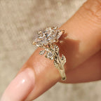 Nature Inspired Marquise Cut Engagement Ring with Round Side Stone