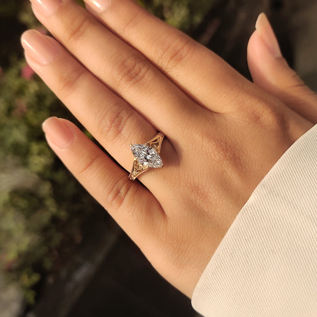 Solitaire Style Marquise Cut Diamond Ring in Milgrain Details