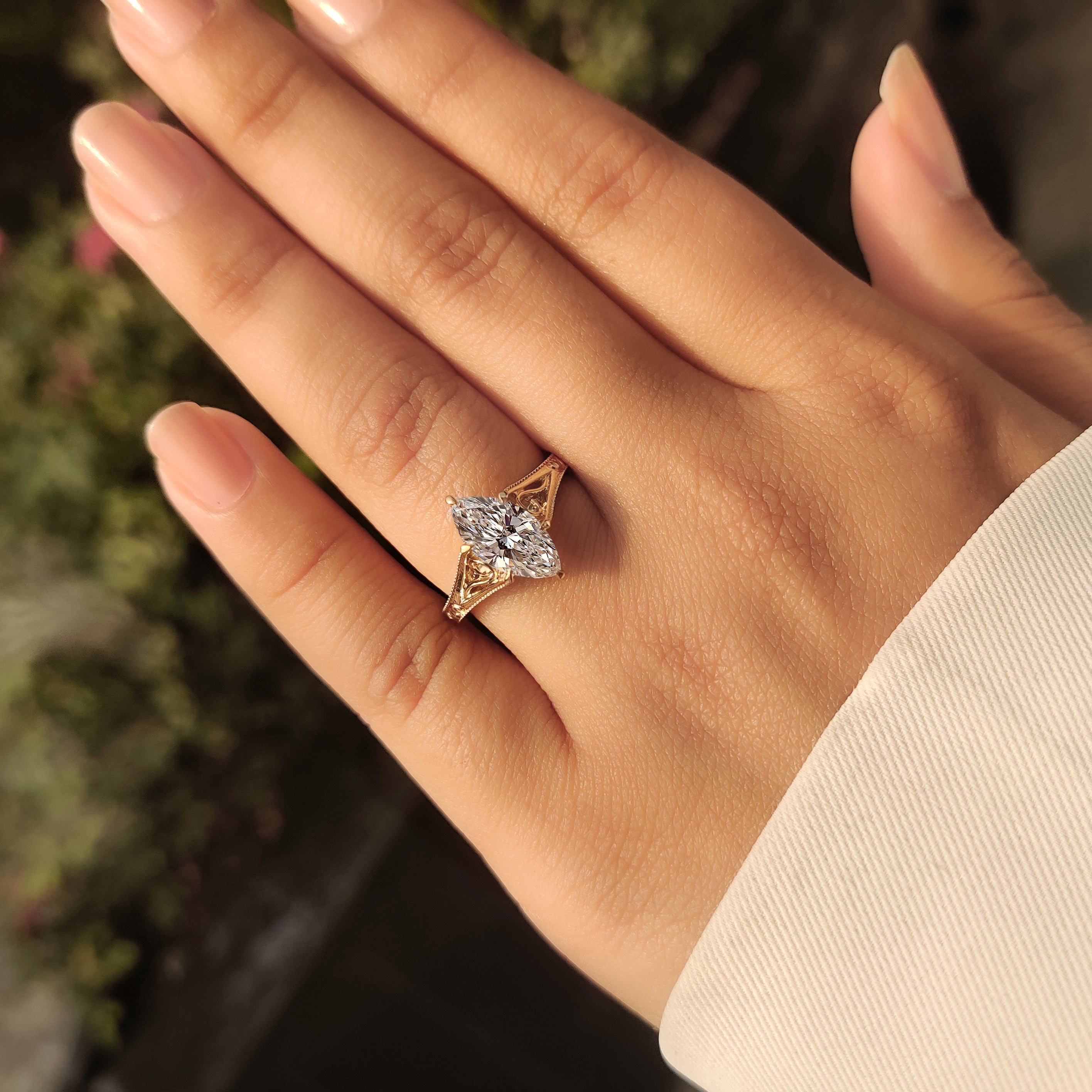 Solitaire Style Marquise Cut Diamond Ring in Milgrain Details